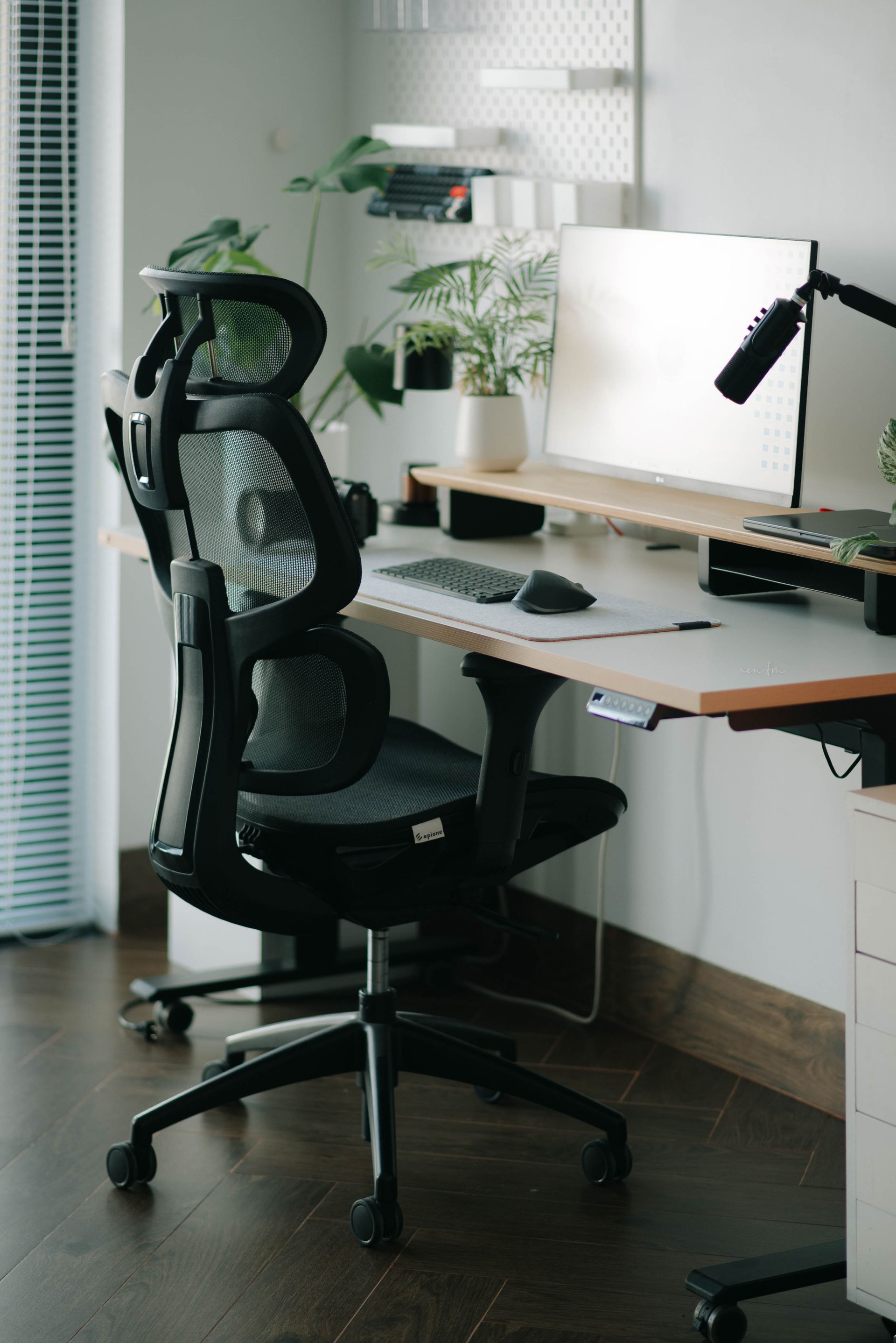 Modern ergonomic office chair in a naturally lit workspace