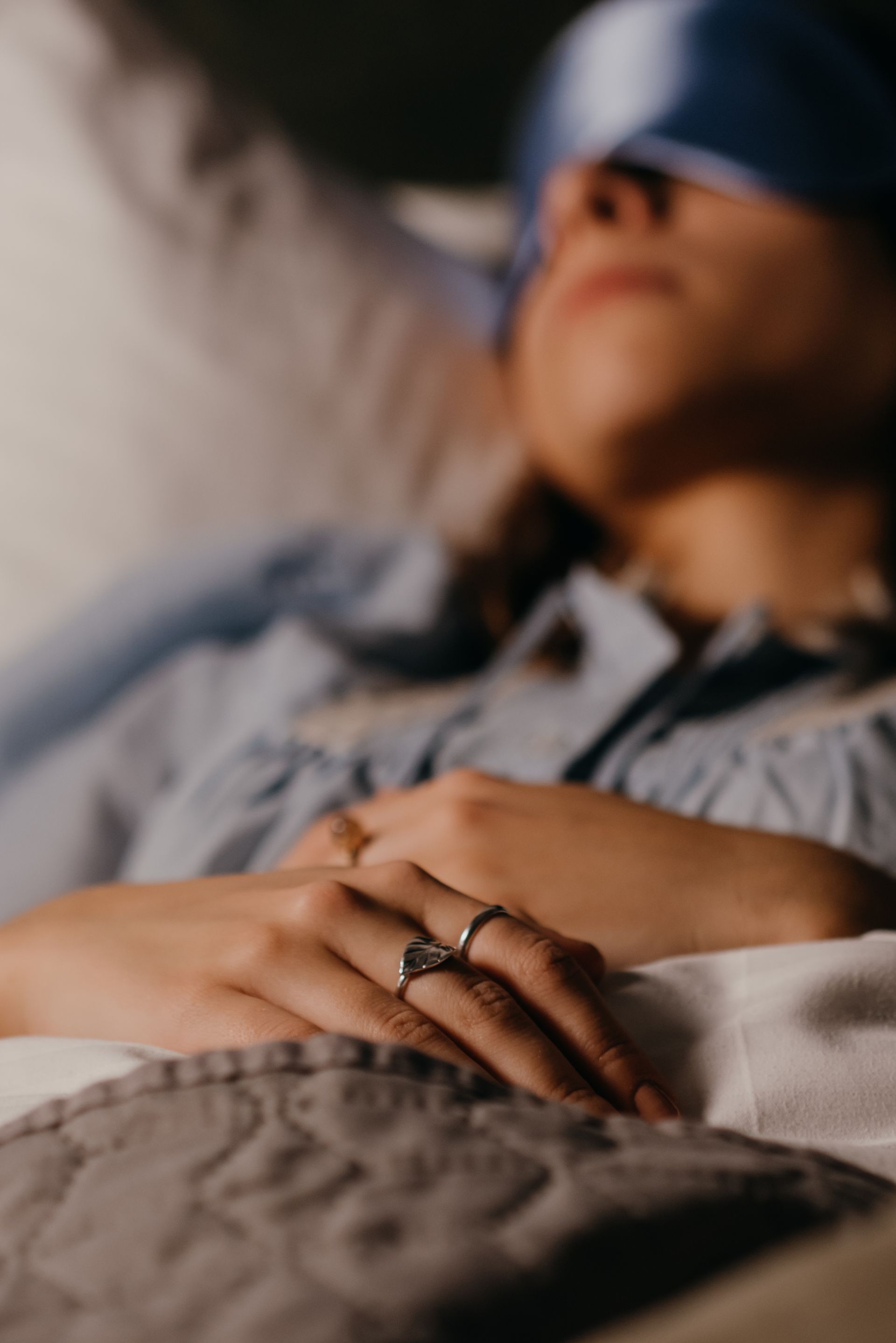 A person sleeping calmly in bed at night